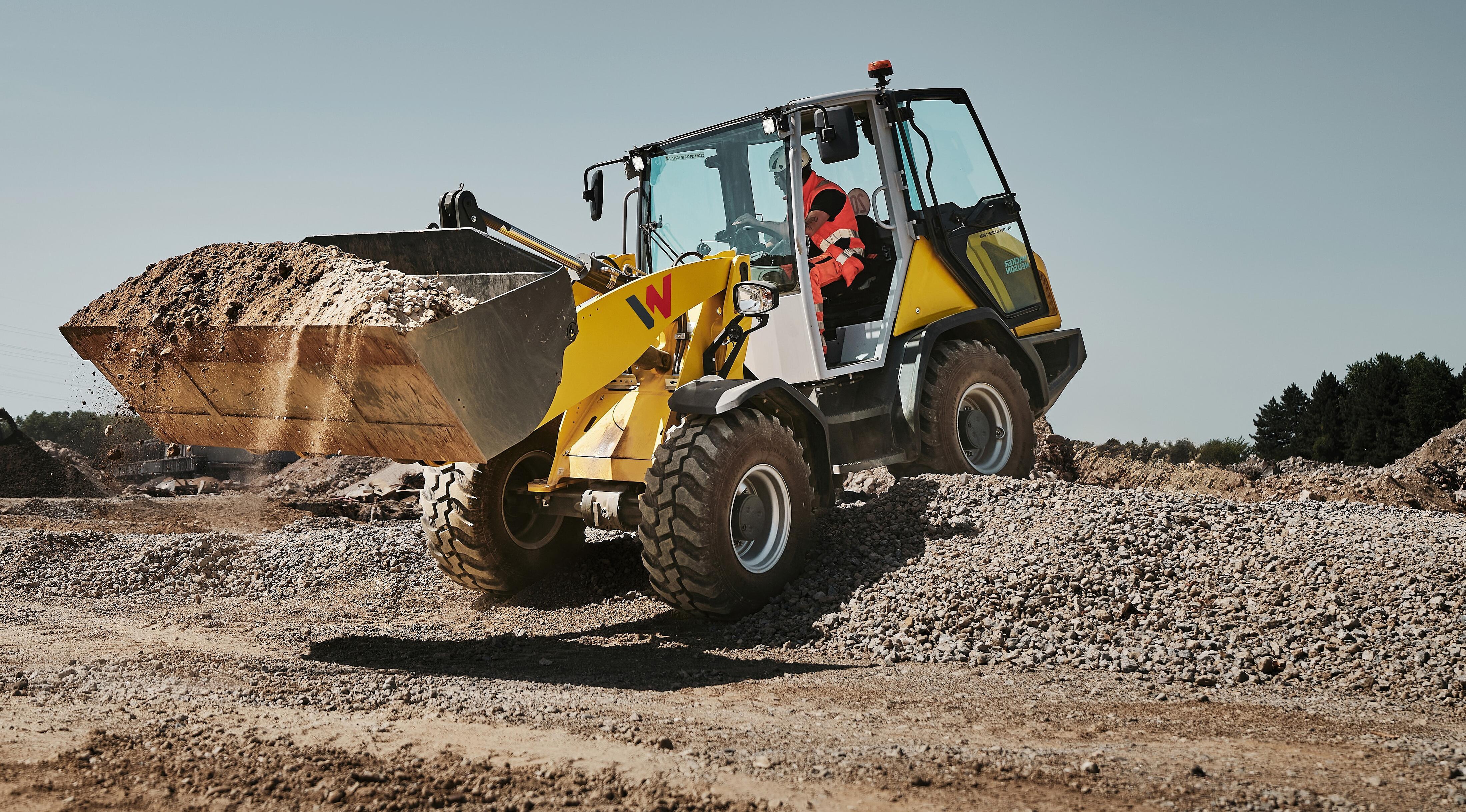 yellow wheel loader WL1150 in action