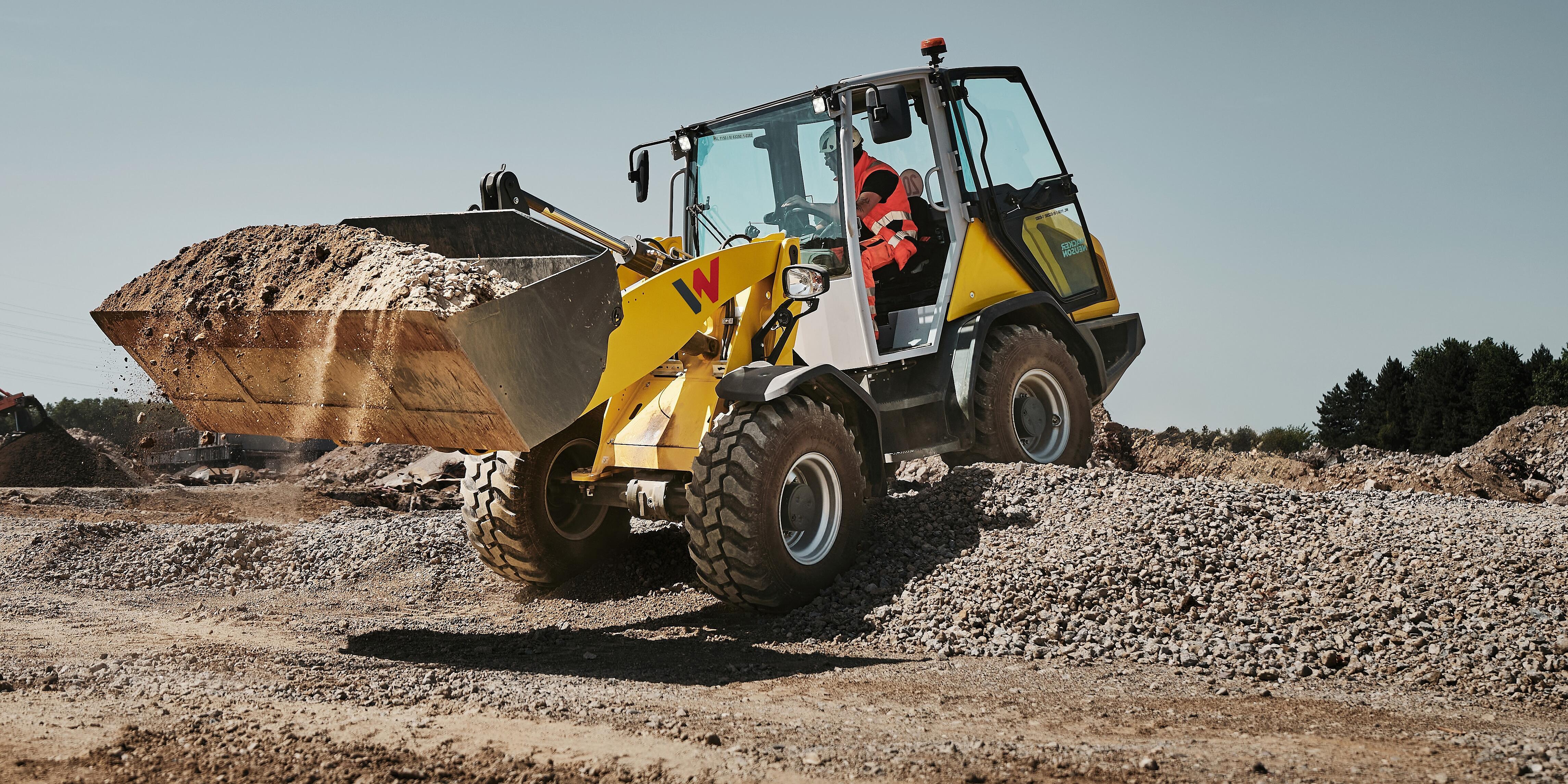yellow wheel loader WL1150 in action