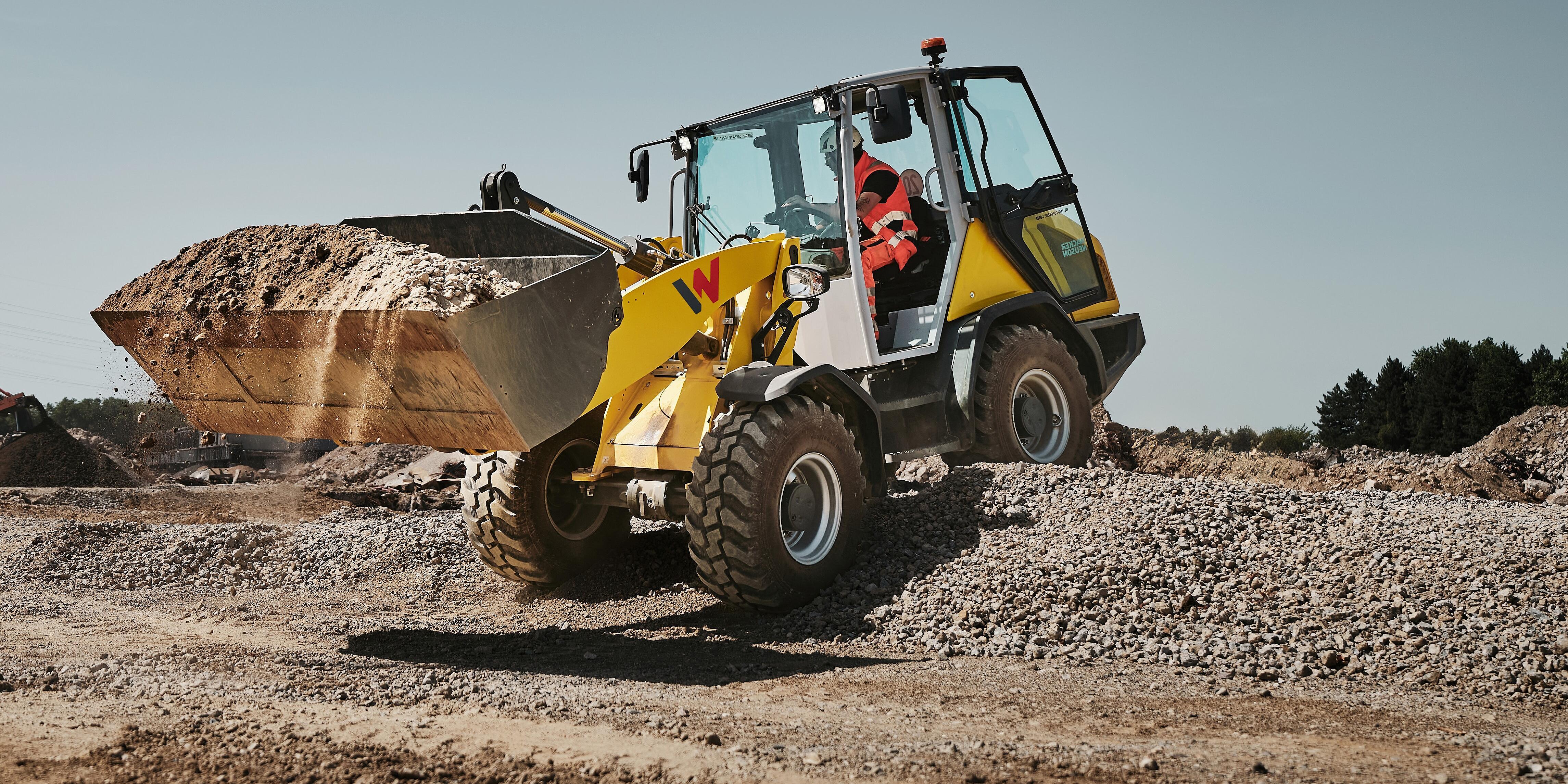 yellow wheel loader WL1150 in action