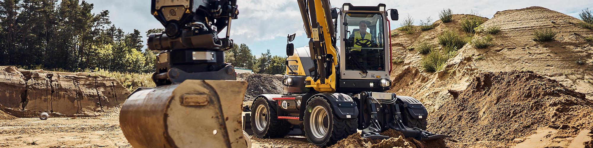 excavator ew100 in action