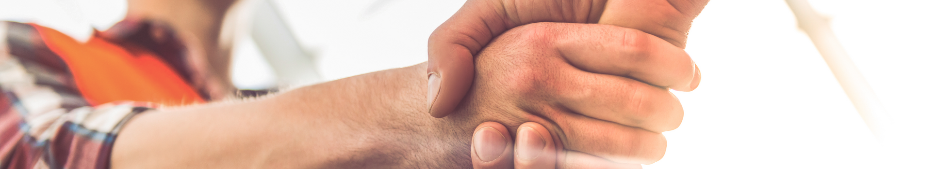 Handshake on a construction site.